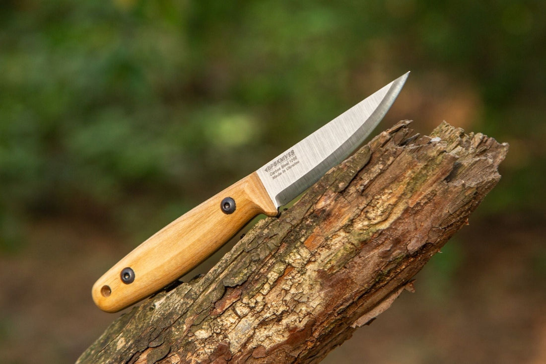 Traditional Finnish puukko knife with wooden handle
