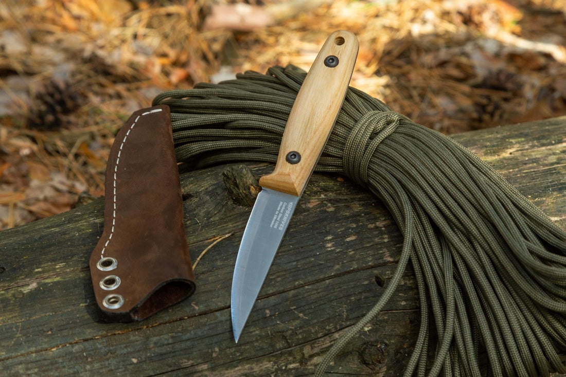 Camping knife and survival knife shown side by side