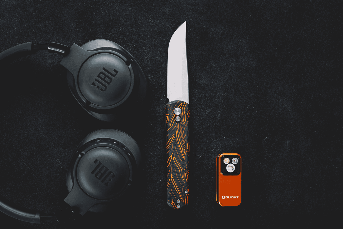 First folding EDC knife held in hand