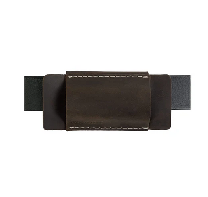 Brown leather belt with a strap on a white background